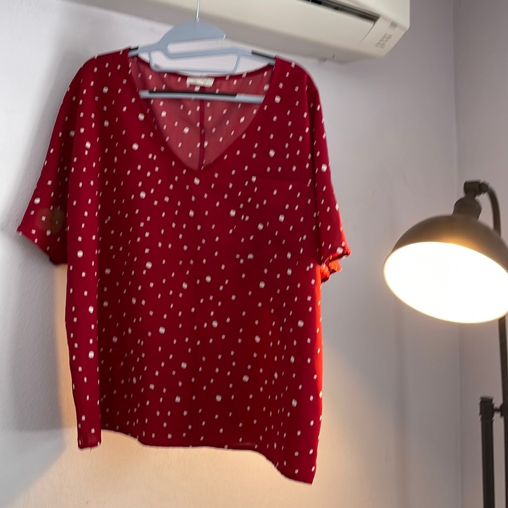 White polka dot red shirt. Boxy flowy fit.